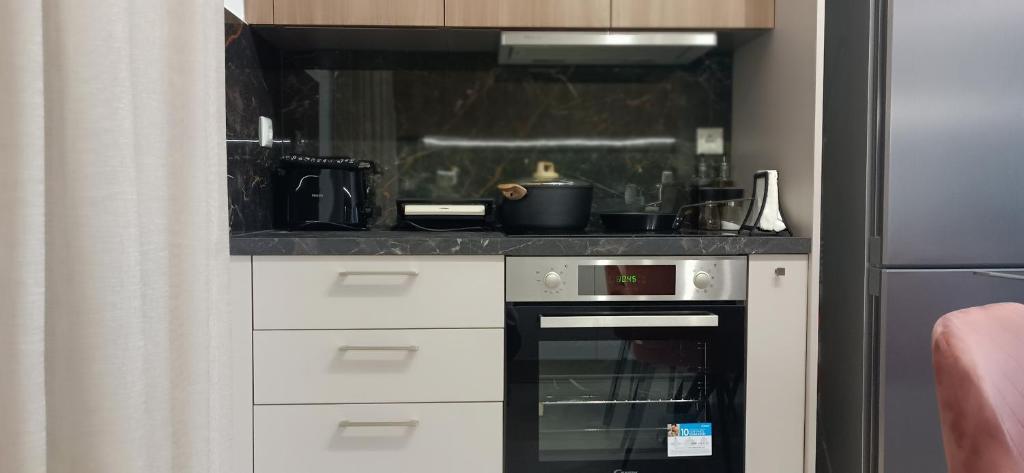 Kuchyň nebo kuchyňský kout v ubytování Morpheus boutique apartment