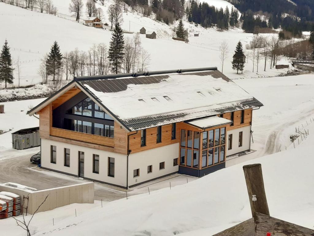 an architectural rendering of a house in the snow at Apartment Kleiner Kessel by Interhome in Kleinsölk