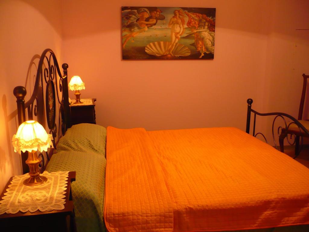 Posteľ alebo postele v izbe v ubytovaní Agriturismo Biologico la Casa degli Gnomi