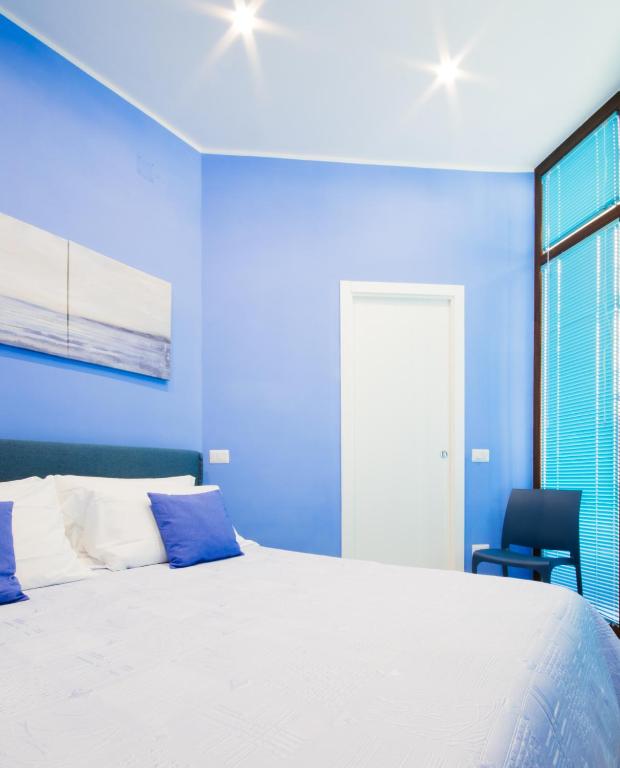 Postel nebo postele na pokoji v ubytování Barone Home