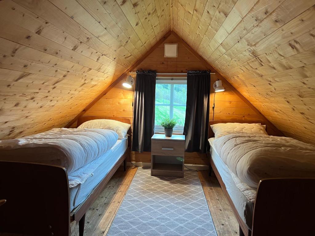 Postel nebo postele na pokoji v ubytování Gjerdset Turistsenter
