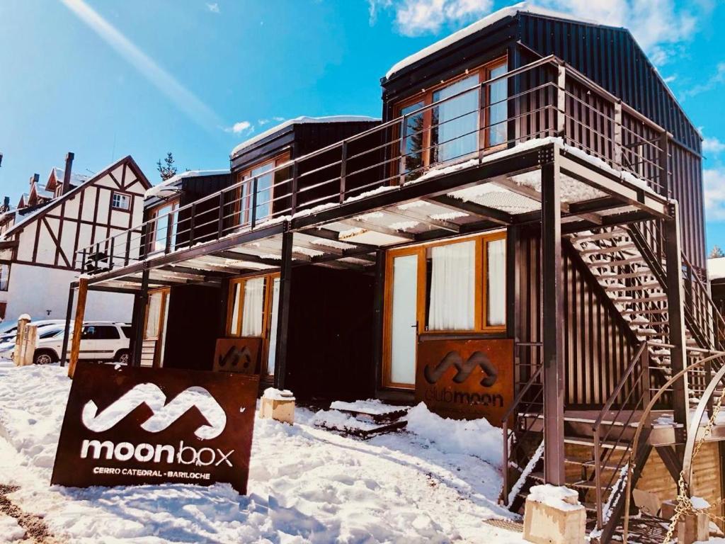 a house is being built in the snow at Moon Box in San Carlos de Bariloche