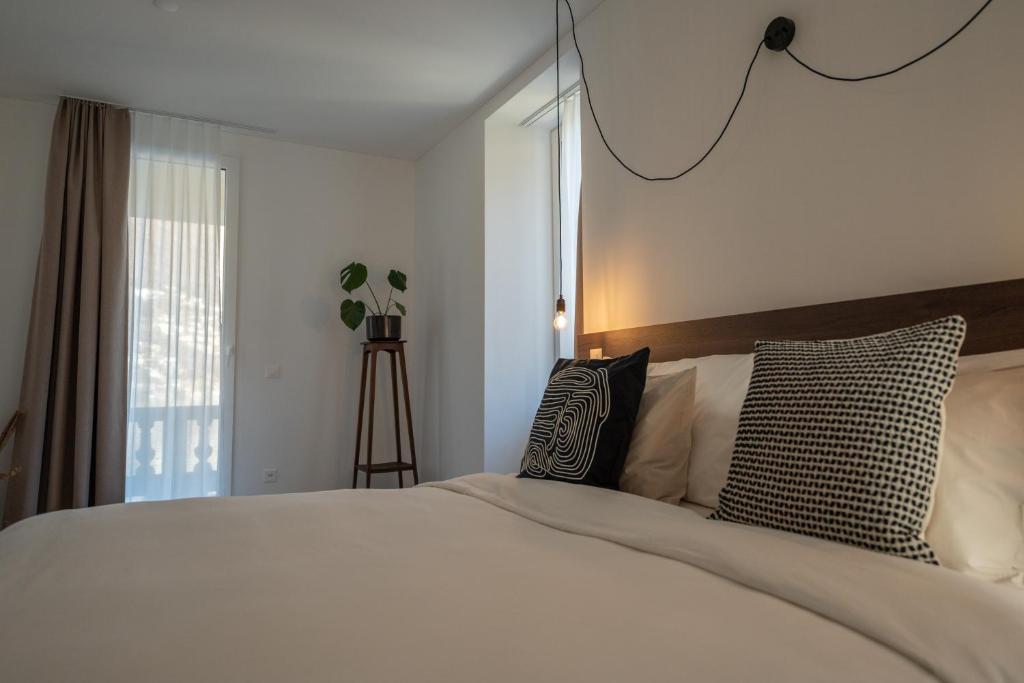 Postel nebo postele na pokoji v ubytování Villa Patria B&B
