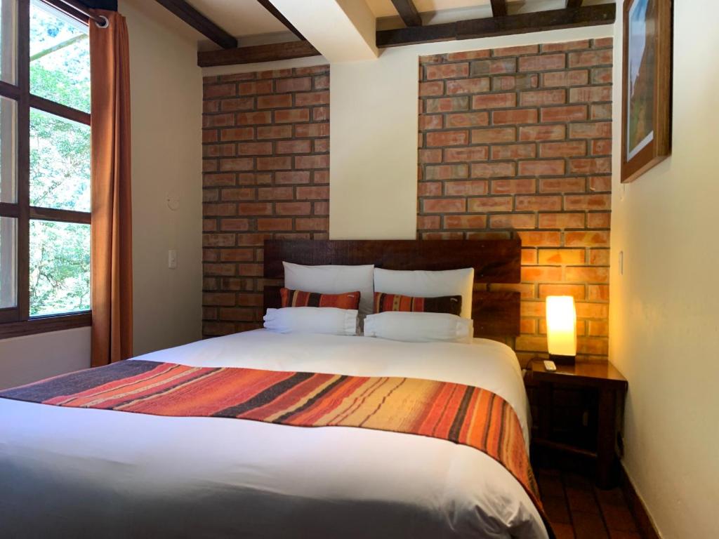 Postel nebo postele na pokoji v ubytování Panorama B&B