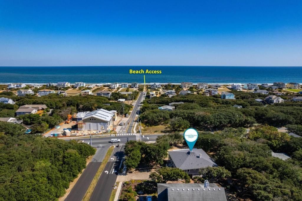 an aerial view of the beach house with a hot air balloon at SH351 Goodnight Dune in Southern Shores
