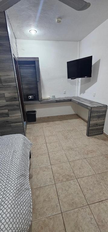 TV a/nebo společenská místnost v ubytování Hotel posada MARCAS