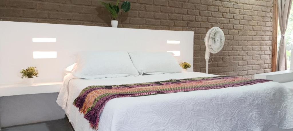 Postel nebo postele na pokoji v ubytování CASA RAÍZ RÍO ANCHO