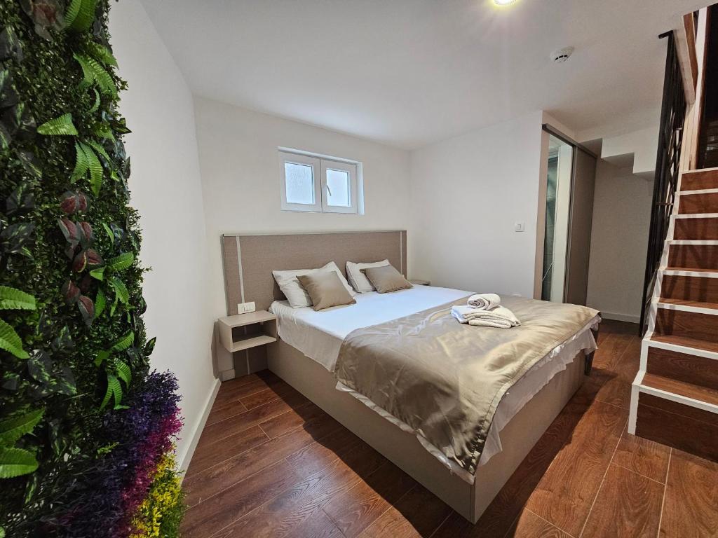 Postel nebo postele na pokoji v ubytování Lolo Luxury rooms & suites