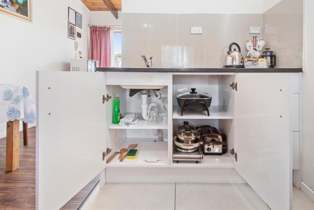 Kuchyň nebo kuchyňský kout v ubytování Grange Motel