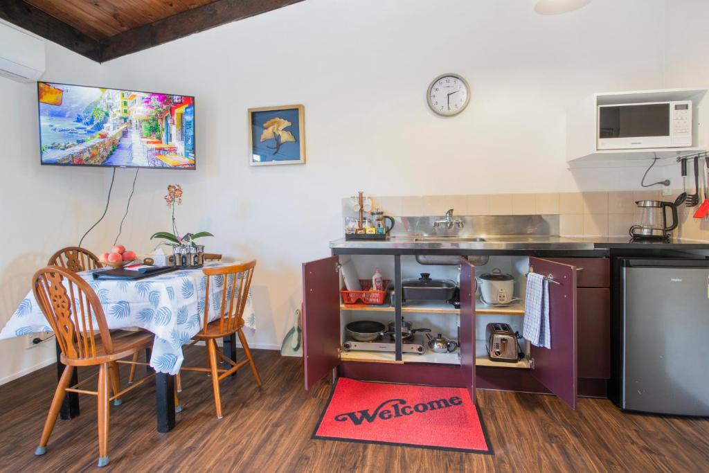 Kuchyň nebo kuchyňský kout v ubytování Grange Motel