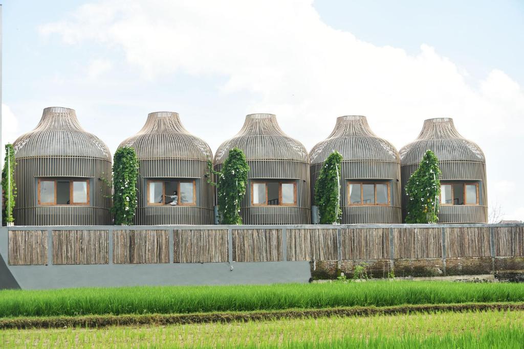 a rendering of a house with domes at Sangkar Cottage & Eatery in Seturan