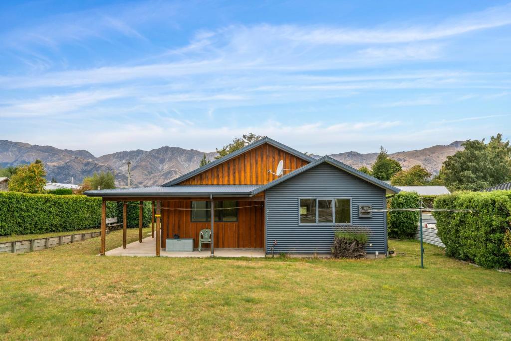 a home with a view of the mountains at Hāwea Delight - Lake Hāwea Holiday Home in Lake Hāwea