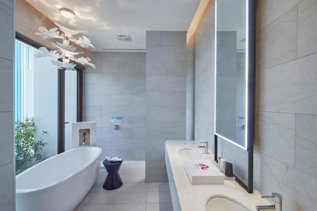 Koupelna v ubytování Domo Hotel