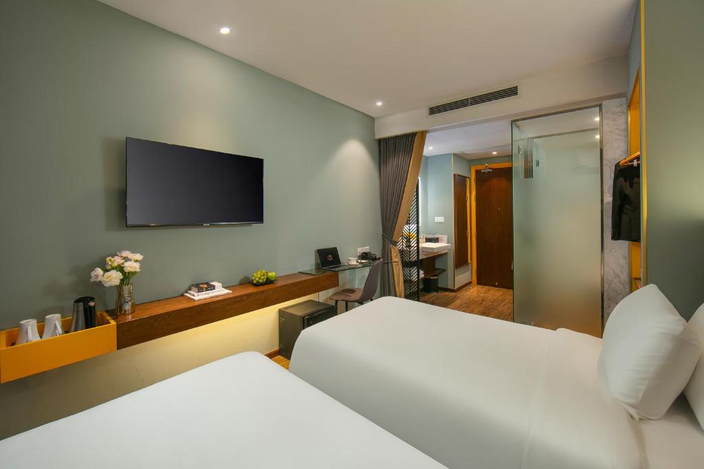 TV a/nebo společenská místnost v ubytování GRAND CITITEL Hanoi Hotel & Spa