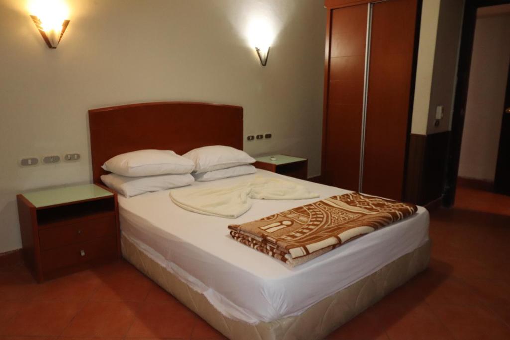 Katil atau katil-katil dalam bilik di Porto Sokhna Red Sea