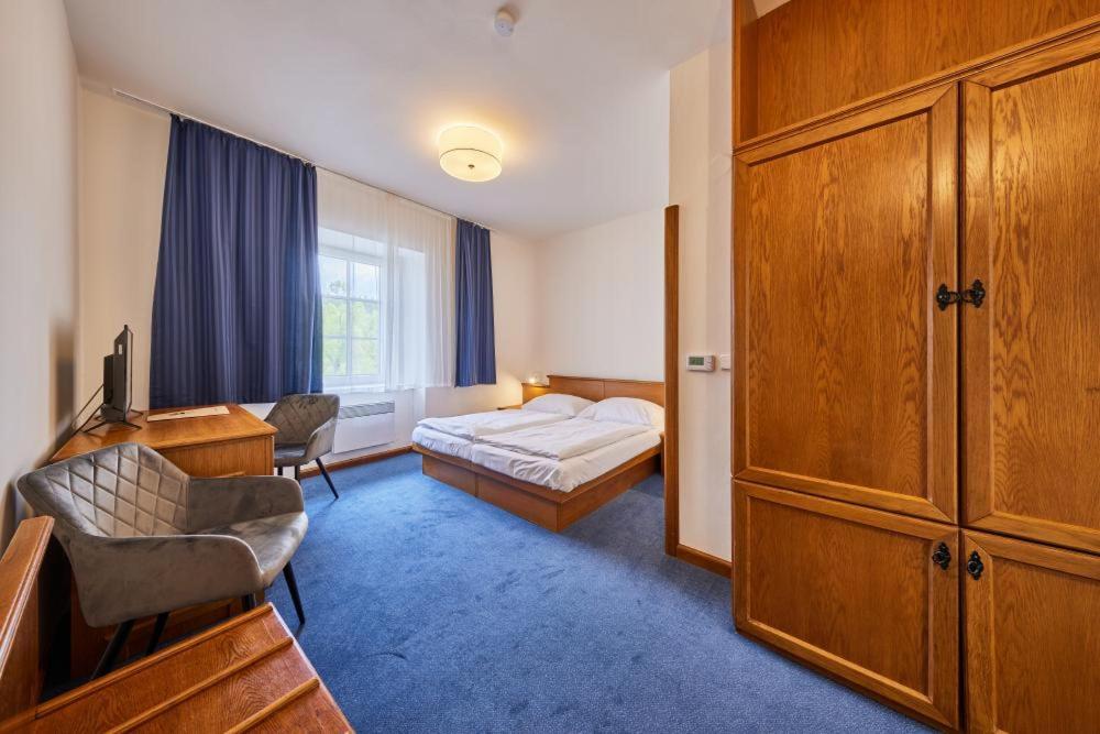 Postel nebo postele na pokoji v ubytování Hotel Auri