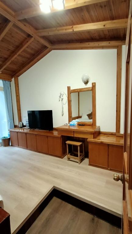 TV a/nebo společenská místnost v ubytování Xitou Tianpin Homestay