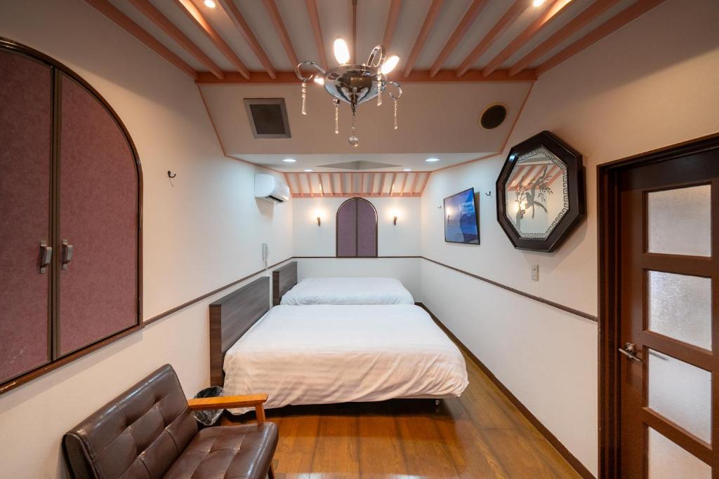 Postel nebo postele na pokoji v ubytování Grand Hotel Narita Airport
