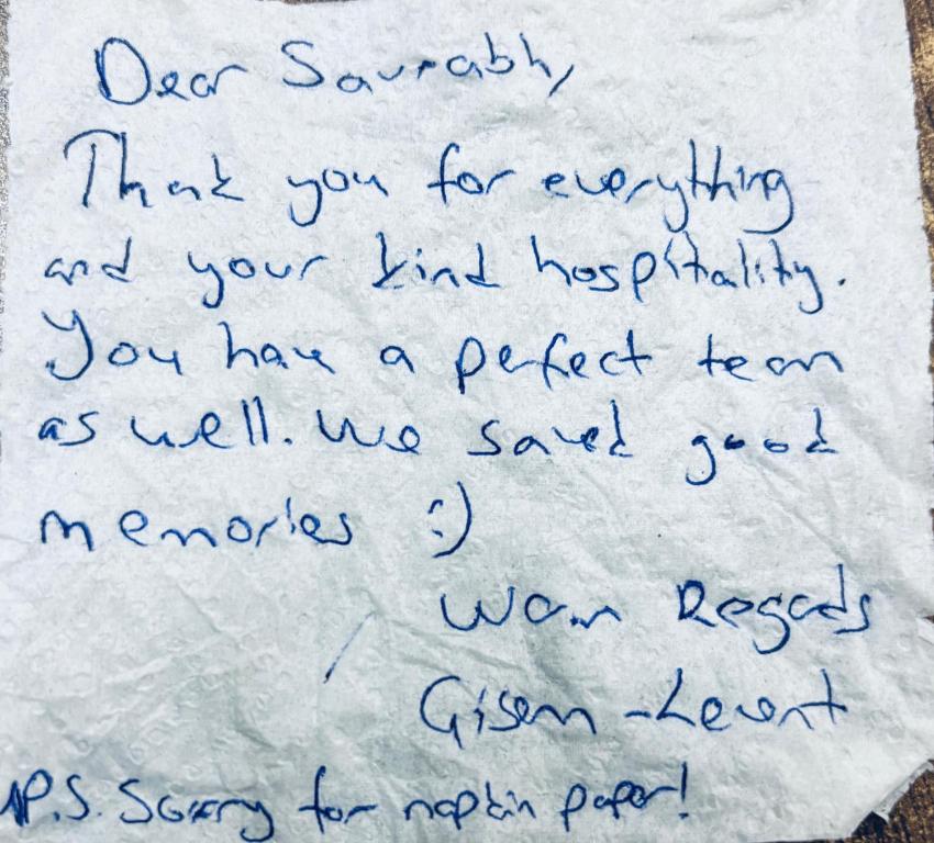 a piece of handwriting on a piece of paper at Gully Ghar in Varanasi