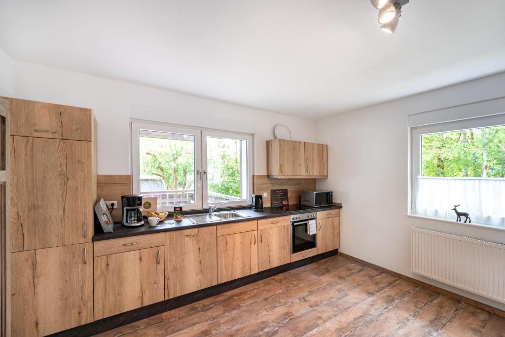Küche/Küchenzeile in der Unterkunft Ferienwohnung Haus An der Lenne