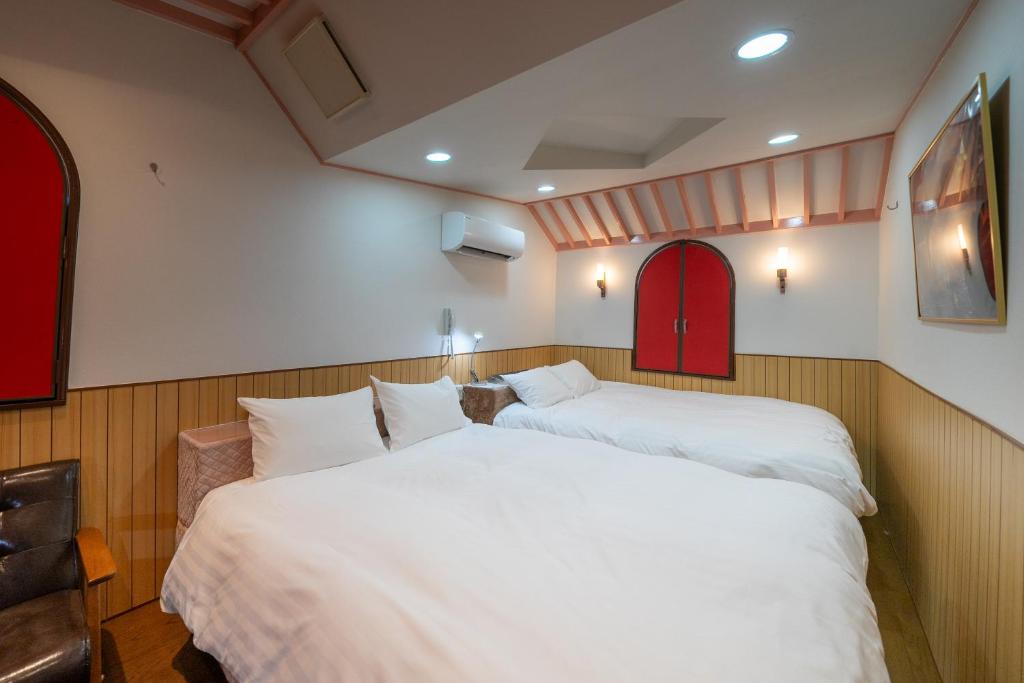 Postel nebo postele na pokoji v ubytování Grand Hotel Narita Airport