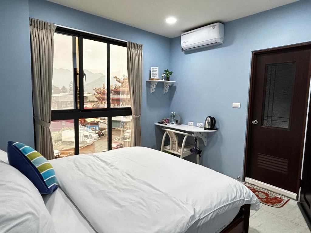 Katil atau katil-katil dalam bilik di Forgather B&B