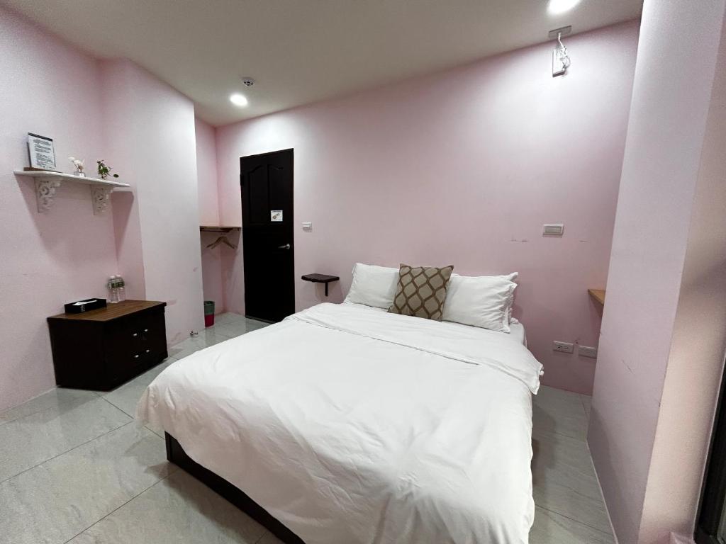 Katil atau katil-katil dalam bilik di Forgather B&B