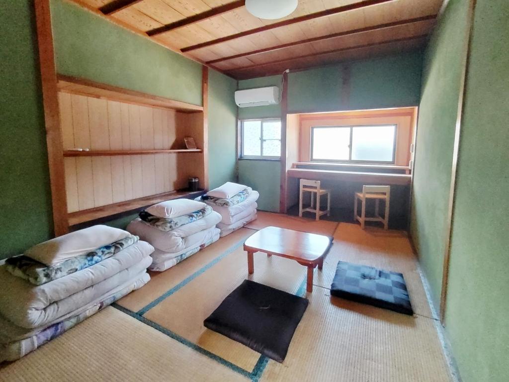 Postel nebo postele na pokoji v ubytování Amino Guesthouse Bench