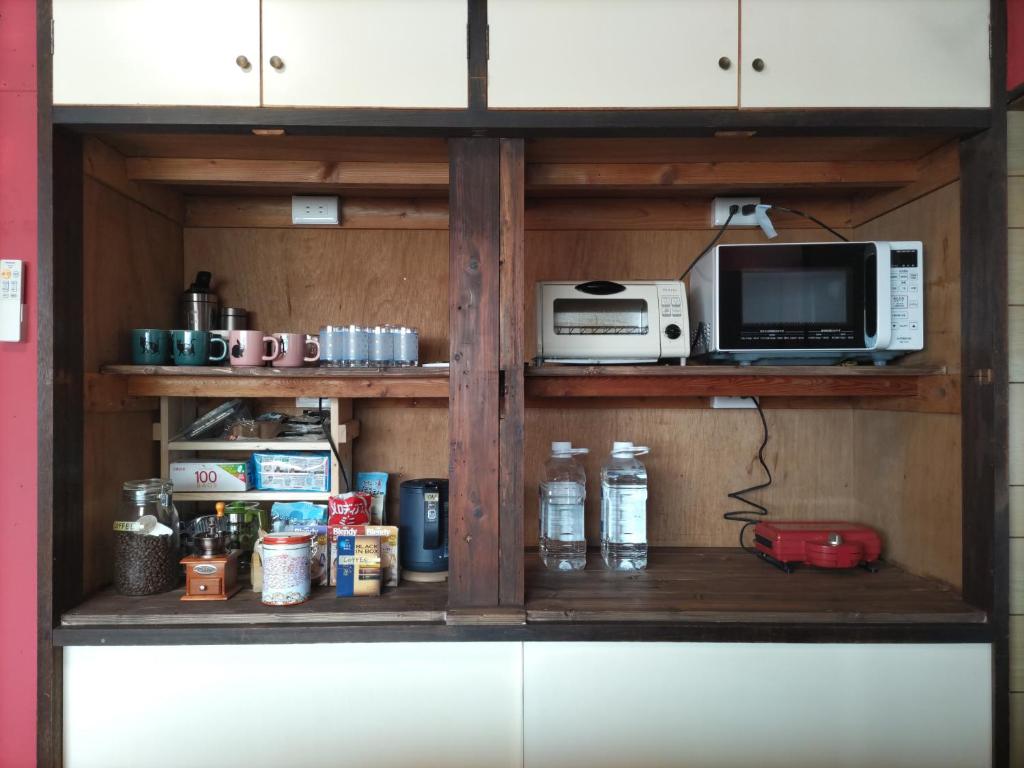 Kuchyň nebo kuchyňský kout v ubytování Amino Guesthouse Bench