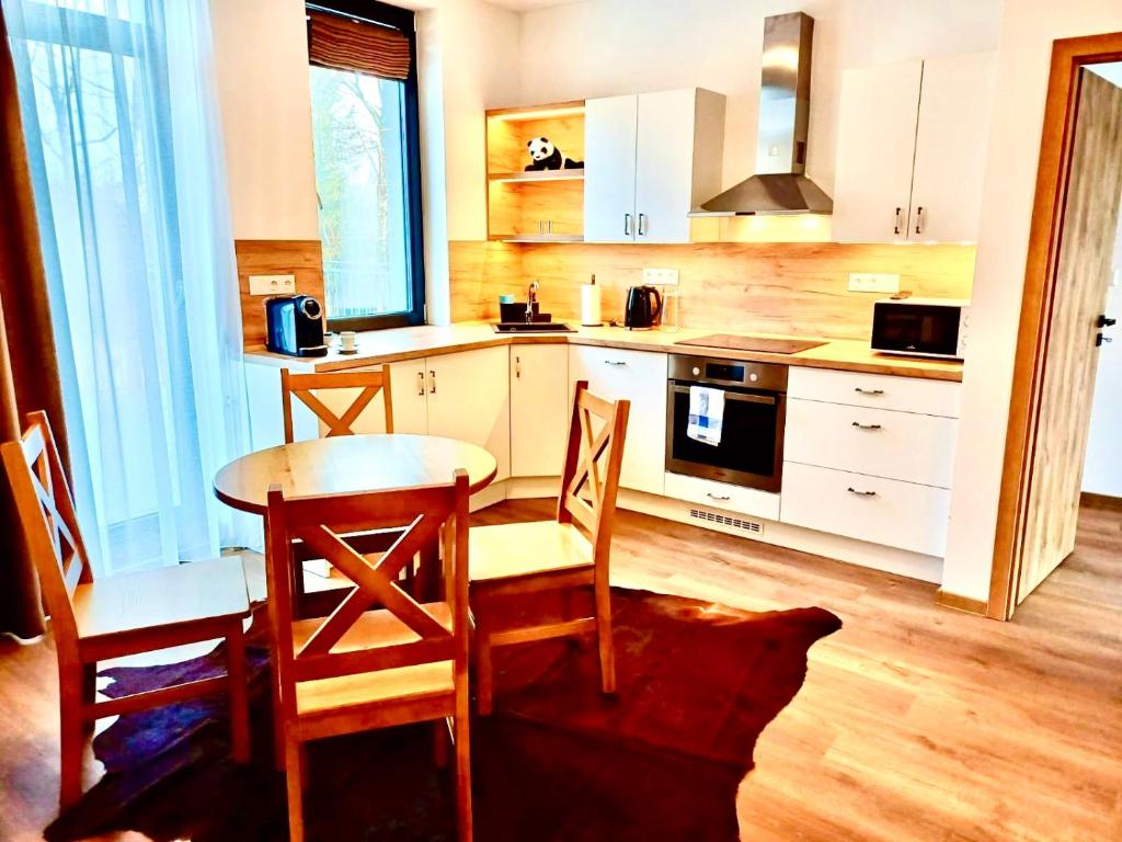 Kuchyň nebo kuchyňský kout v ubytování Paseky Apartments Resort