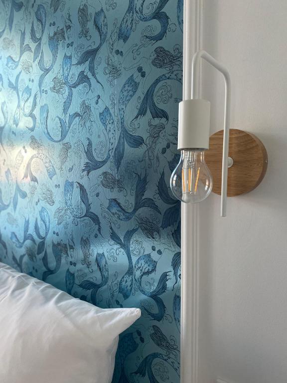 Postel nebo postele na pokoji v ubytování Hotel Altes Dichterhaus