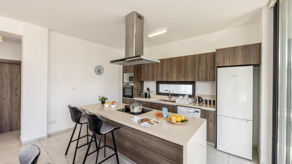 Kuchyň nebo kuchyňský kout v ubytování Diamond villas