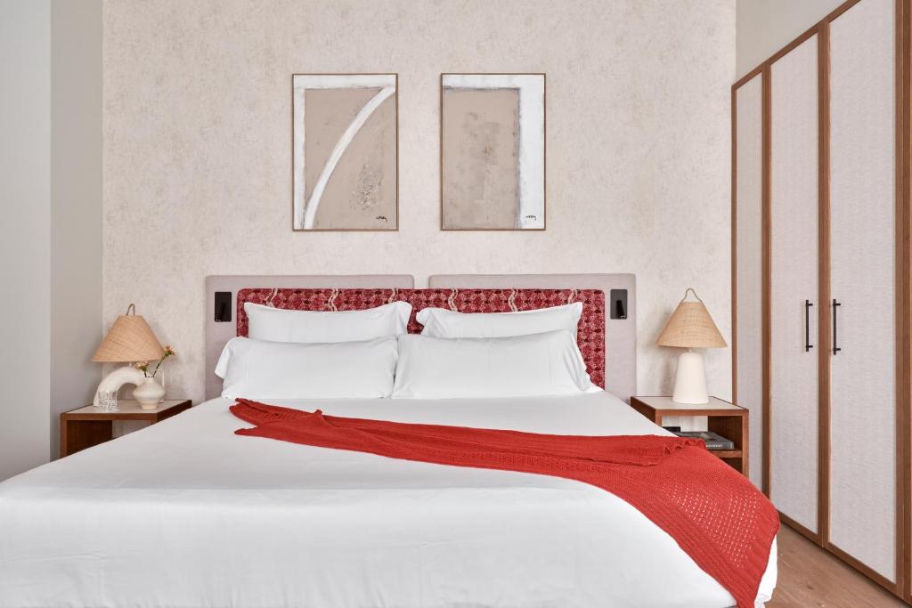 Postel nebo postele na pokoji v ubytování Boutique Hotel Posada Terra Santa