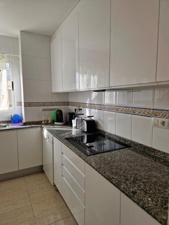 A kitchen or kitchenette at Relax en la playa