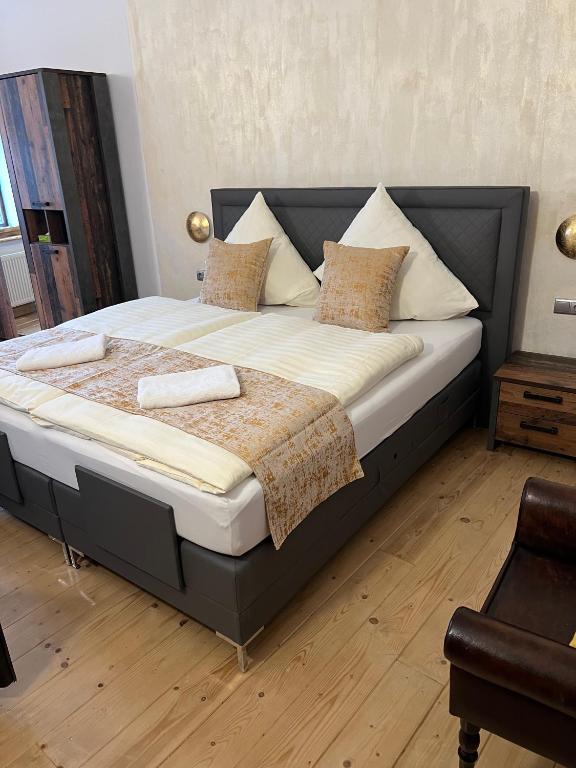 Postel nebo postele na pokoji v ubytování Pension & Restaurant Atmosféra