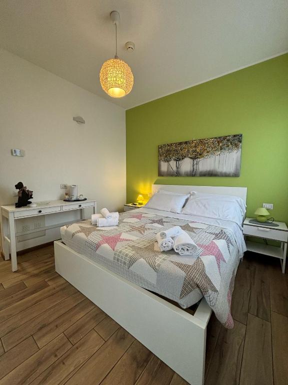 Postel nebo postele na pokoji v ubytování Airuno Rooms