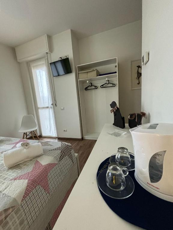 Postel nebo postele na pokoji v ubytování Airuno Rooms