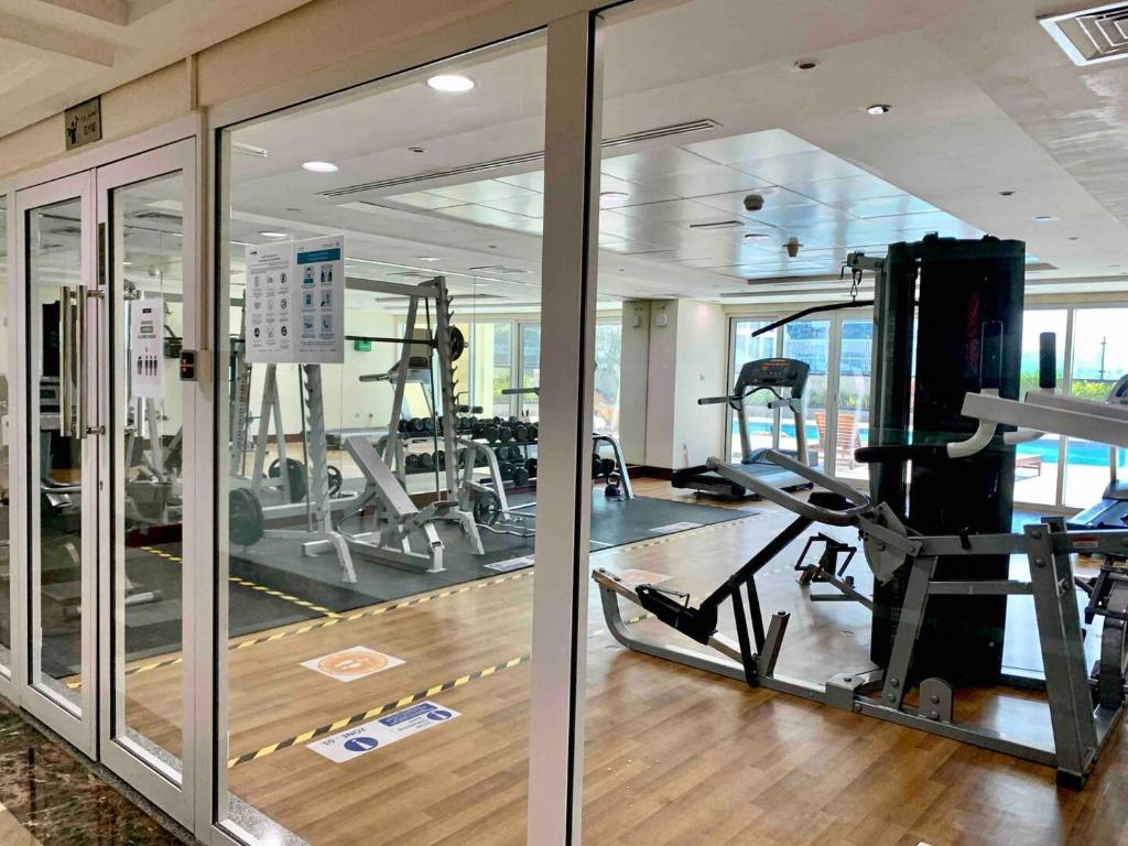 O centro de fitness e/ou as comodidades de fitness de Jlt Spacious Corner Duplex Loft Panoramic Views
