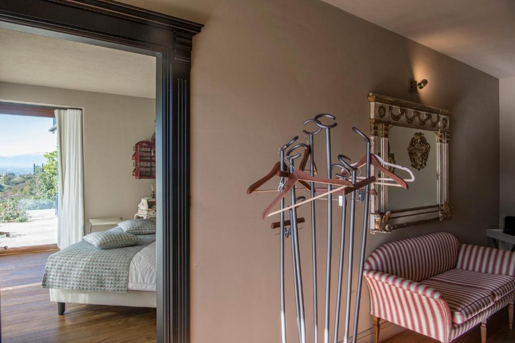 Postel nebo postele na pokoji v ubytování Relais Le Due Matote
