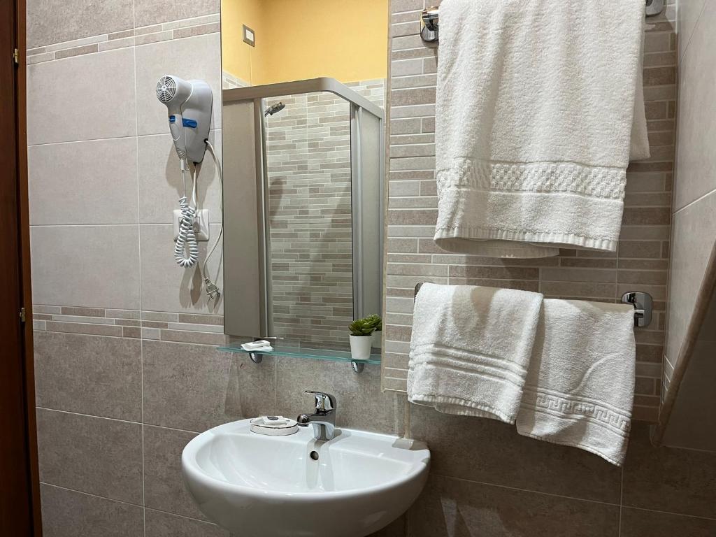 Koupelna v ubytování Le Ganze