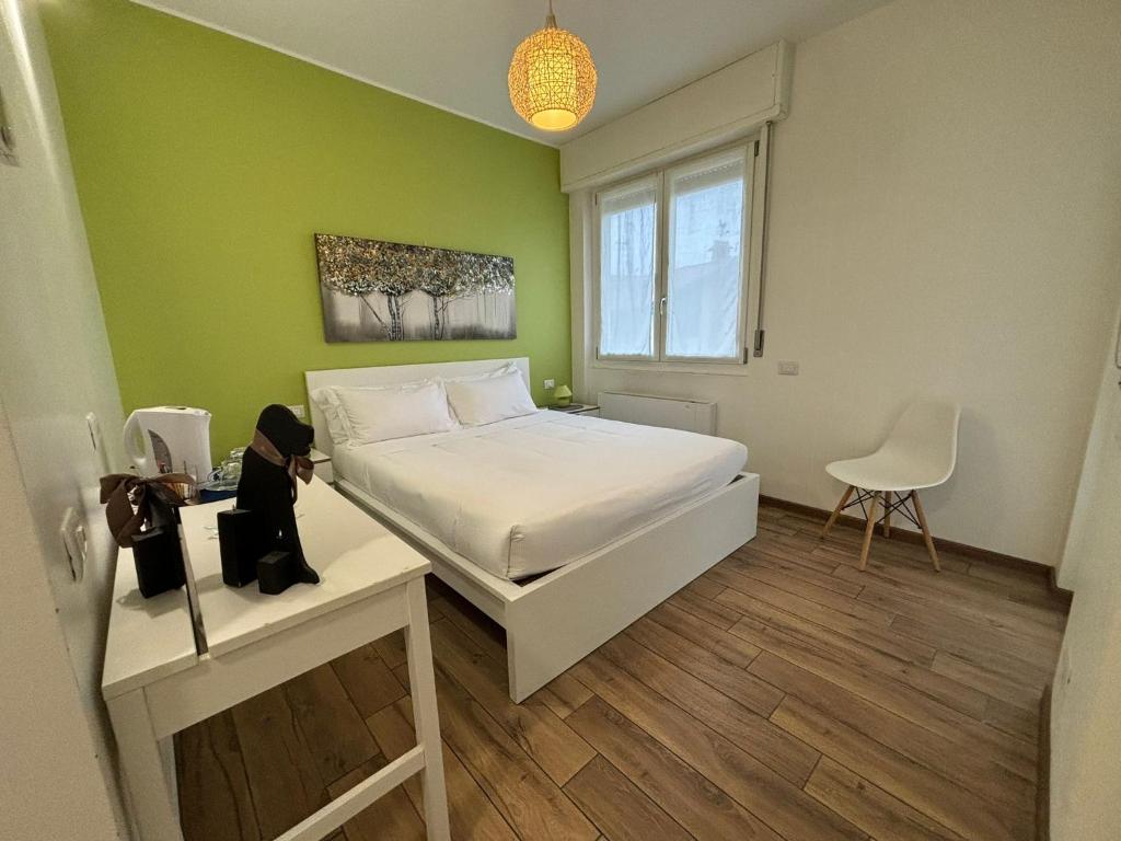 Postel nebo postele na pokoji v ubytování Airuno Rooms