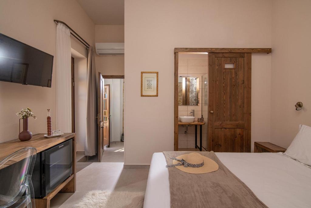 Postel nebo postele na pokoji v ubytování CARPE DIEM HOTEL