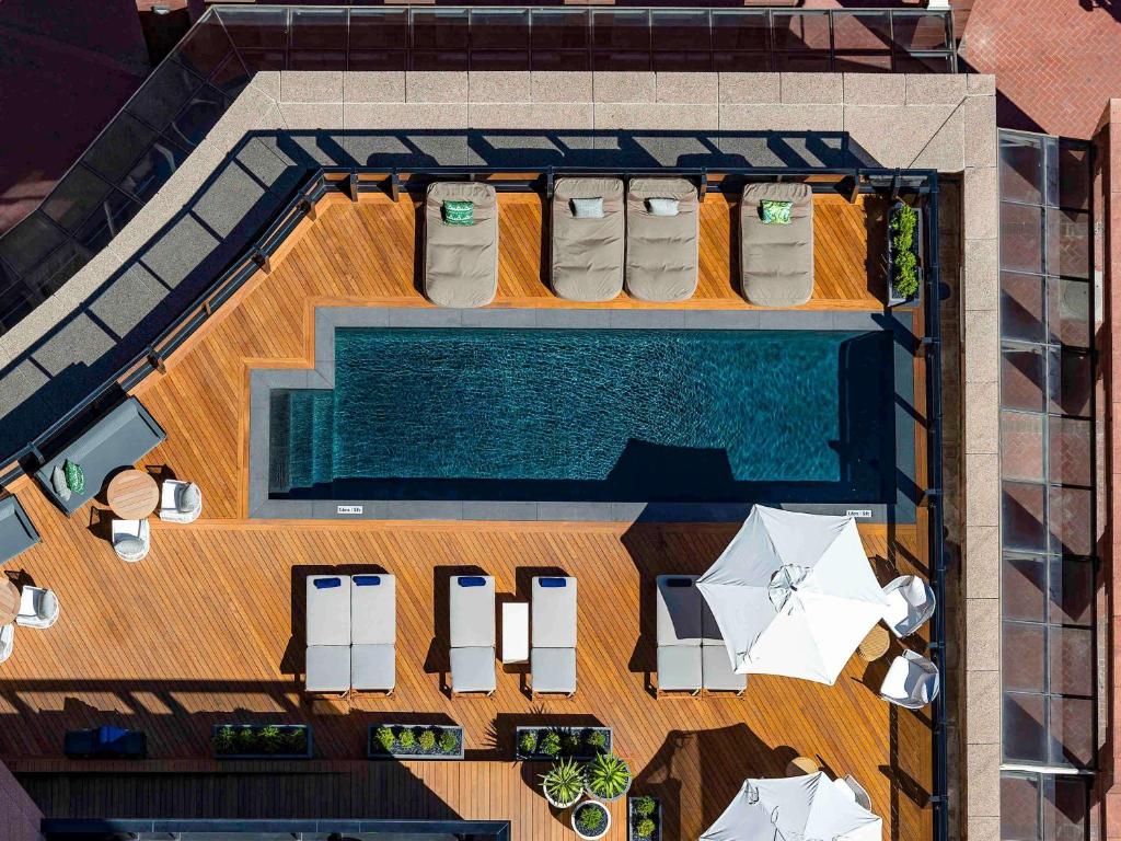 an overhead view of a swimming pool on a house at Pullman Cape Town City Centre in Cape Town