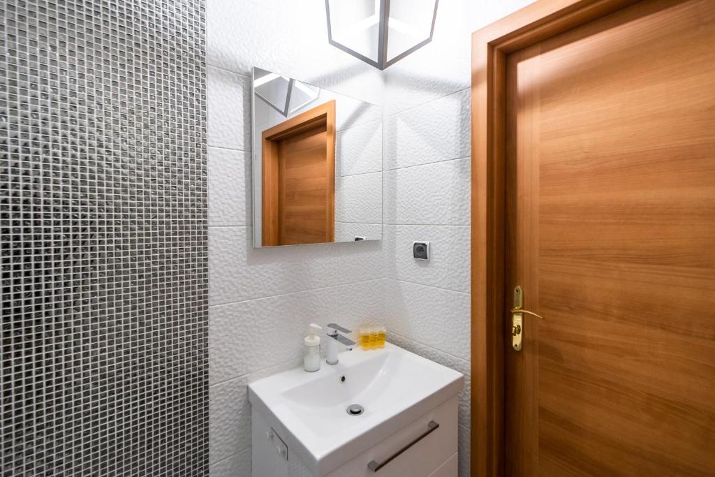 Kúpeľňa v ubytovaní APT Nadmorskie - Portowe