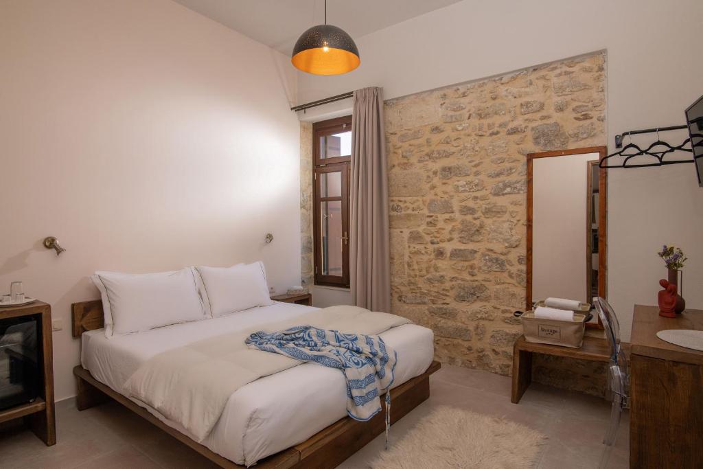 Postel nebo postele na pokoji v ubytování CARPE DIEM HOTEL