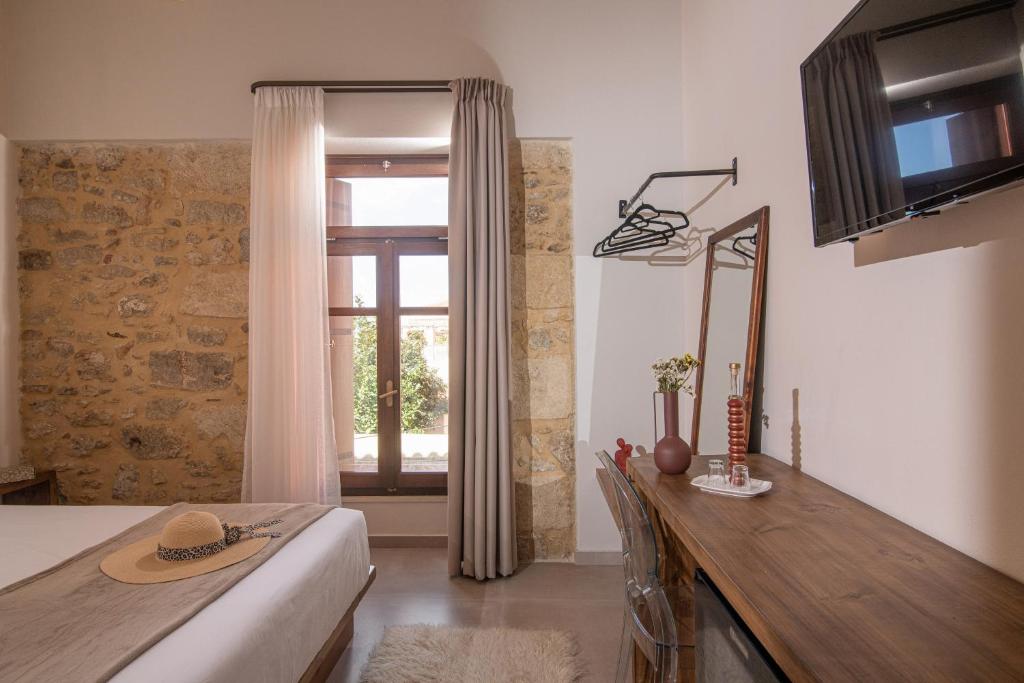 TV a/nebo společenská místnost v ubytování CARPE DIEM HOTEL