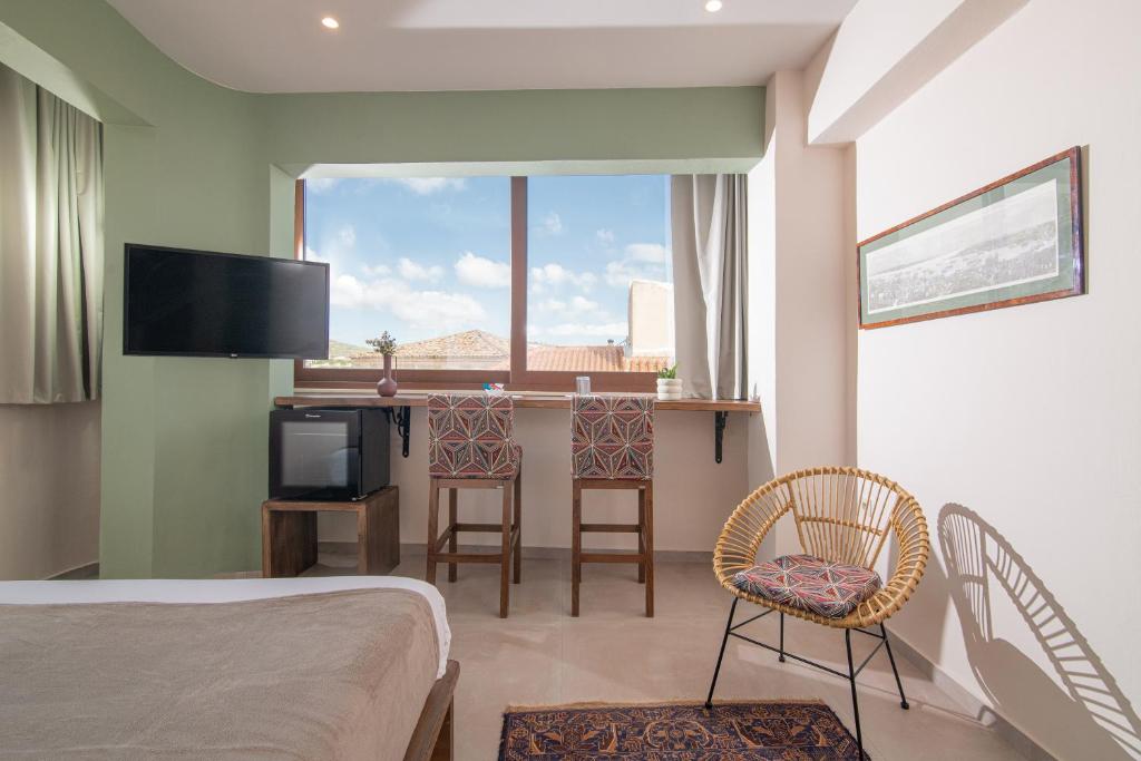 TV a/nebo společenská místnost v ubytování CARPE DIEM HOTEL
