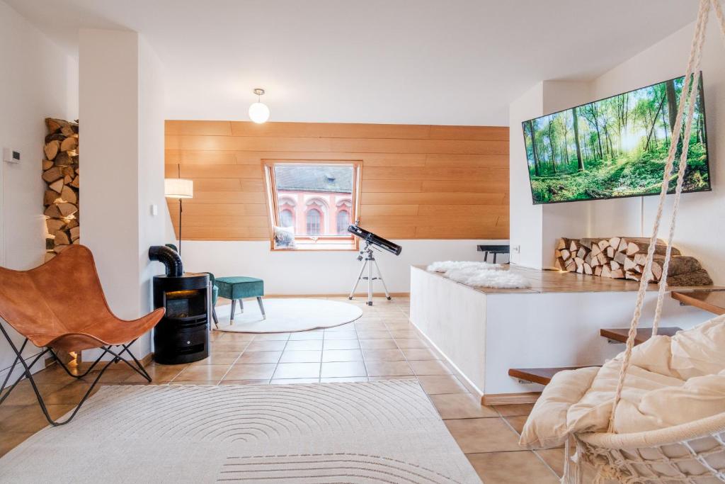 TV a/nebo společenská místnost v ubytování NEU Deluxe Suite Münsterblick, Maisonette, Kingsize Bett, Küche, Netflix, Aussicht, E-Kamin