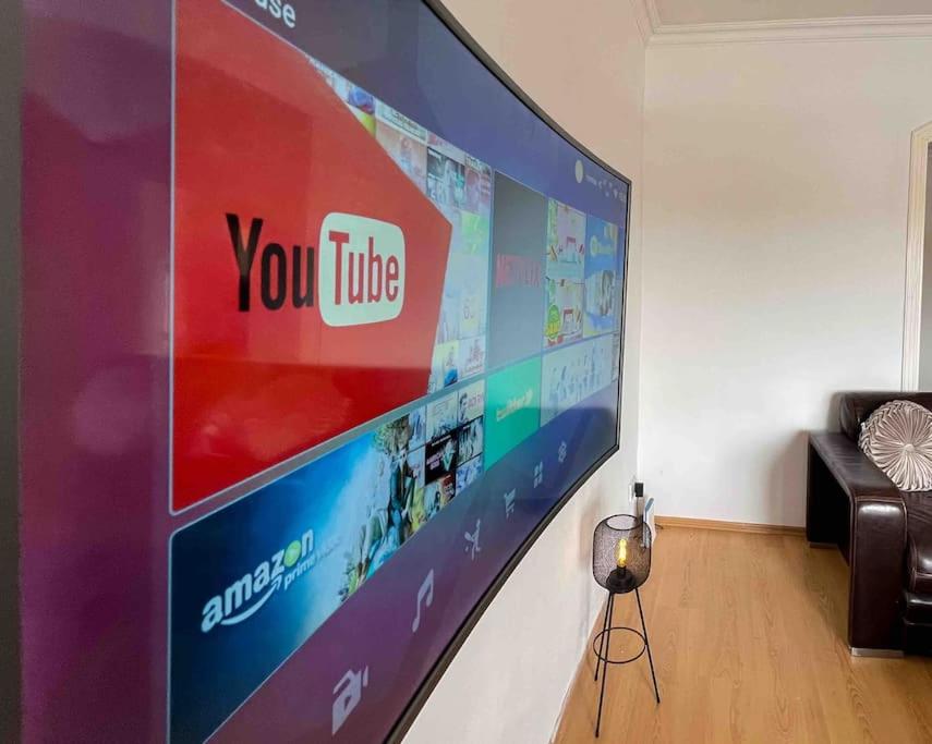 TV a/nebo společenská místnost v ubytování Bay view Appartment