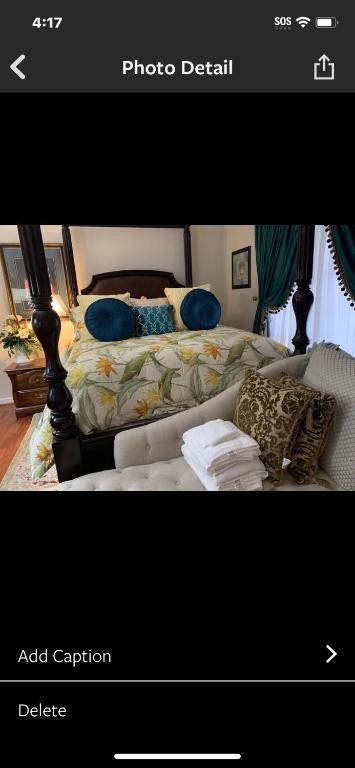 Una foto de un dormitorio con cama en A place to stay worry free, en Greensboro